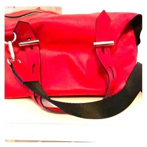 Red crossover bag.